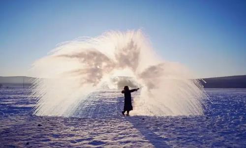 Water-Splashing-To-Freeze-Snow-Town